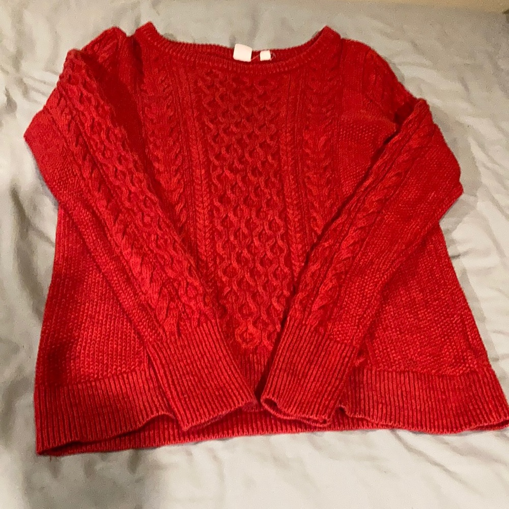Women’s red cable-knit sweater